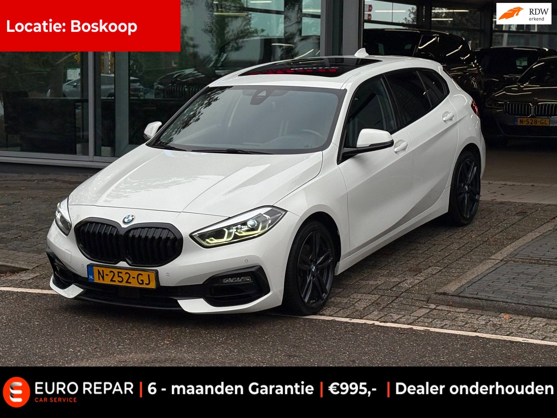 BMW 1-serie 118i High Executive PANO-DAK NIEUW MODEL!, Dealer onderhouden, Gebruikt, Wit, Leder