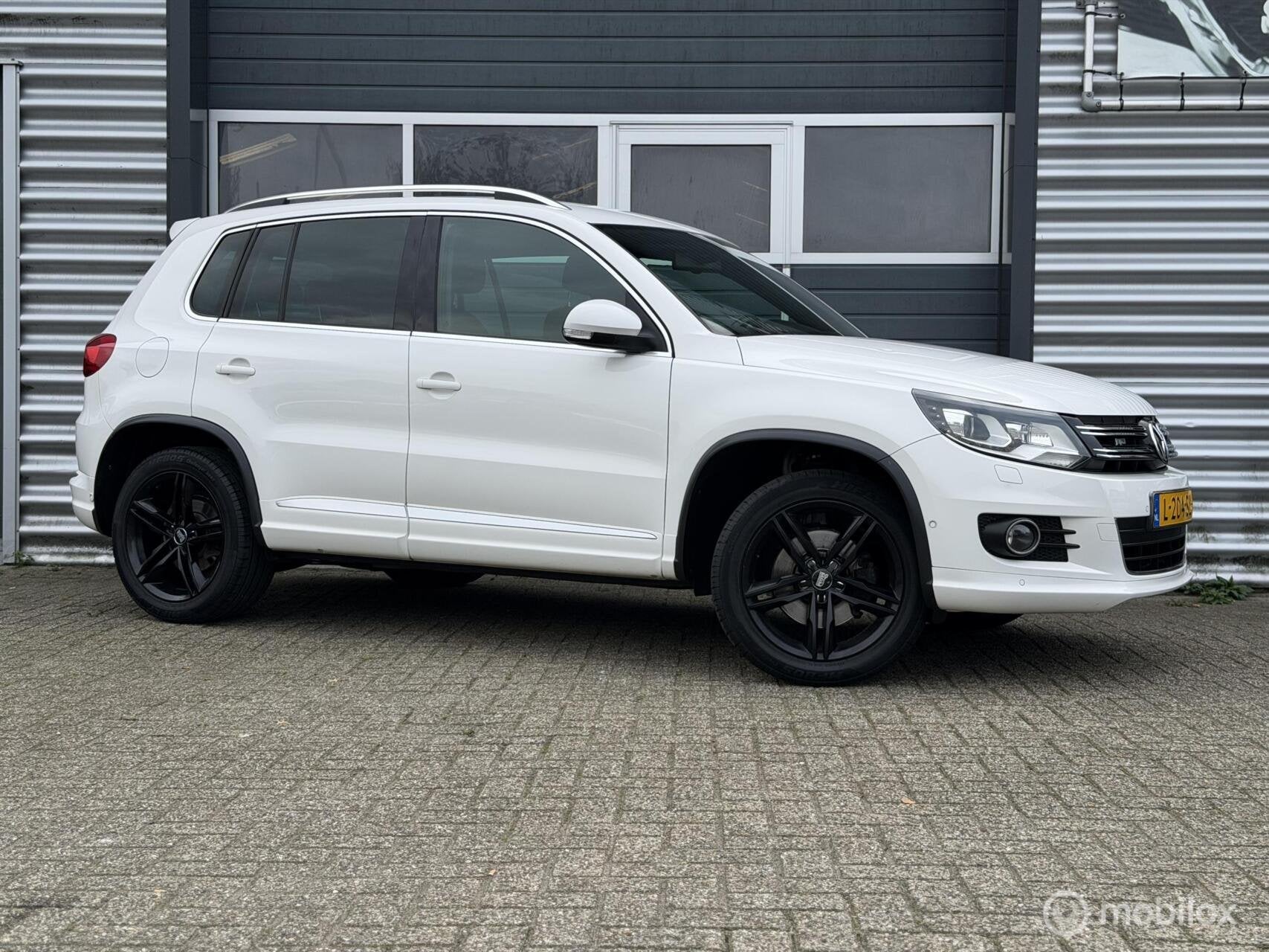Volkswagen Tiguan 1.4 TSI 4Motion 160PK R-Line|Motorrevisie|, Auto's, 13 km/l, Euro 5, Stof, Gebruikt