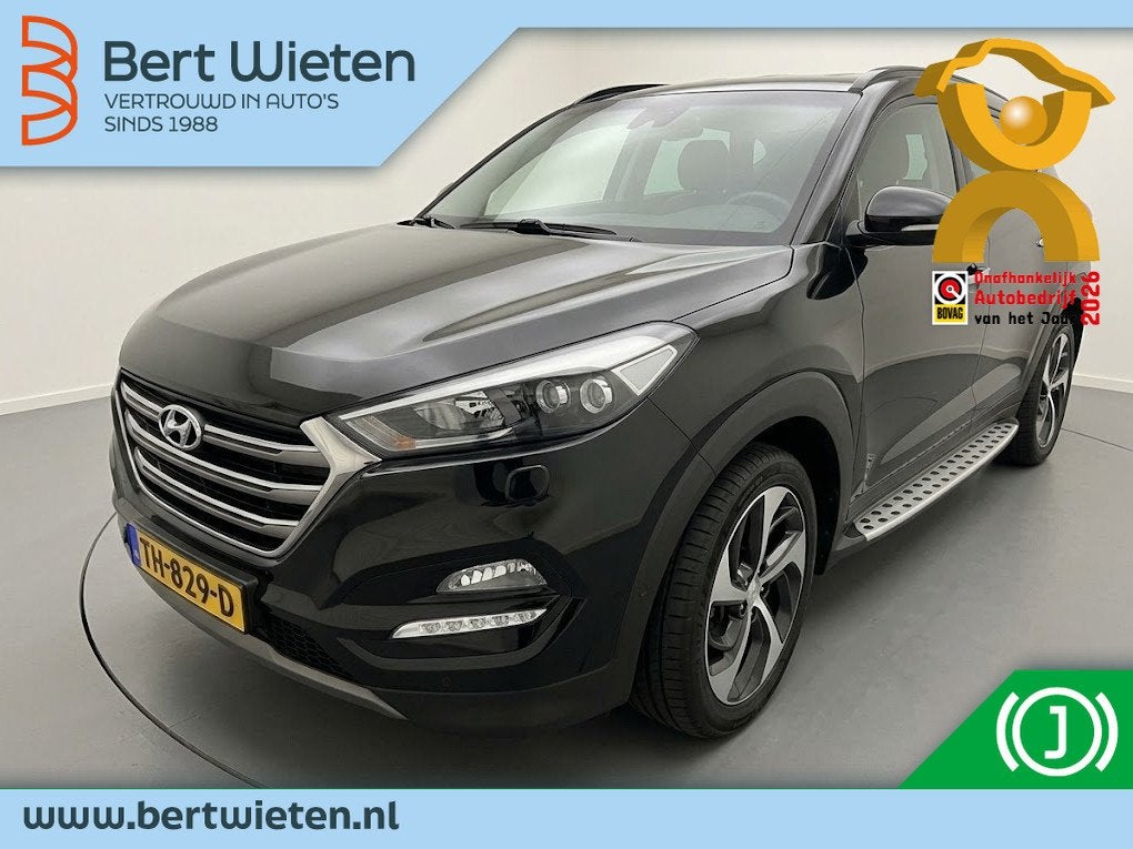 Hyundai Tucson 1.6 T-GDi Prem. 4WD, Auto's, Automaat, Gebruikt, 4 cilinders, Parkeerassistent