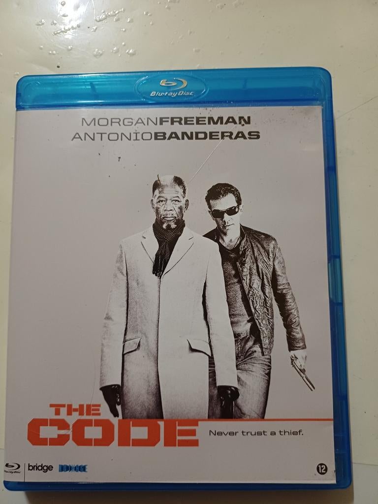 The Code, Ophalen of Verzenden, Zo goed als nieuw, Actie