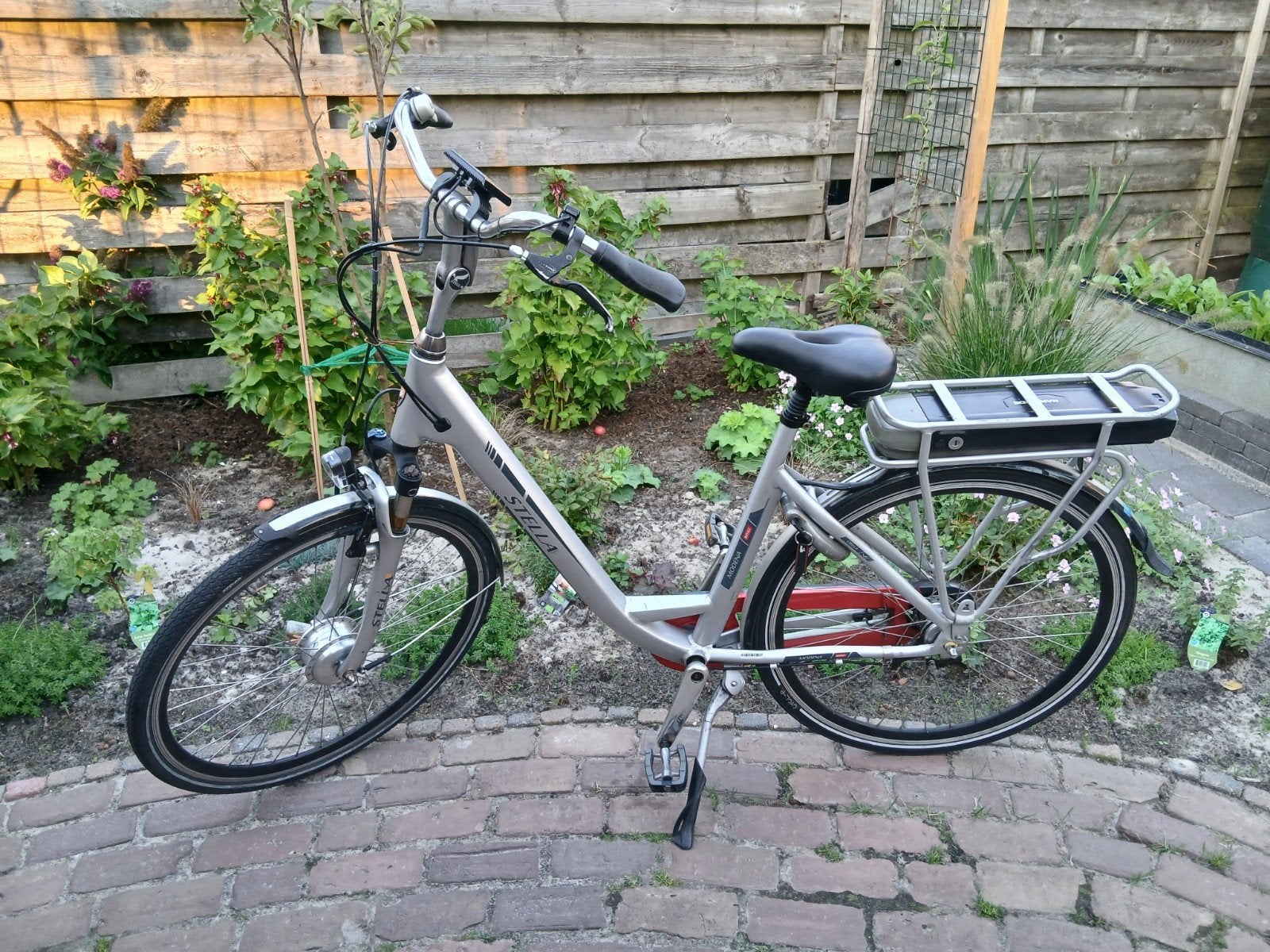 Stella Modena elektrische fiets, Gebruikt, 51 tot 55 cm, 50 km per accu of meer, Ophalen