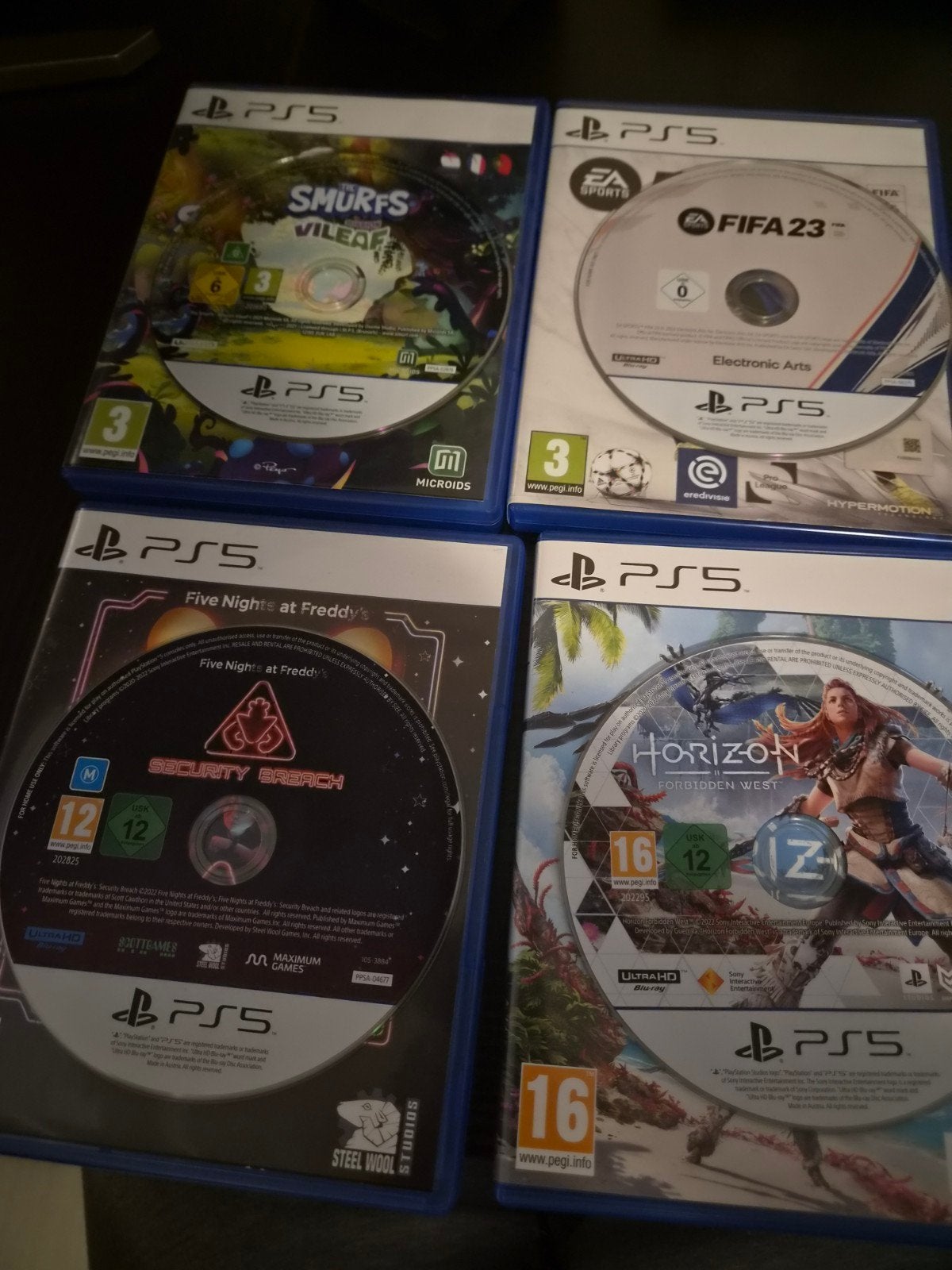 PS5 Games Bundel: Smurfs, FIFA 23, Five Nights, Horizon, Spelcomputers en Games, Online, Overige genres, Ophalen of Verzenden