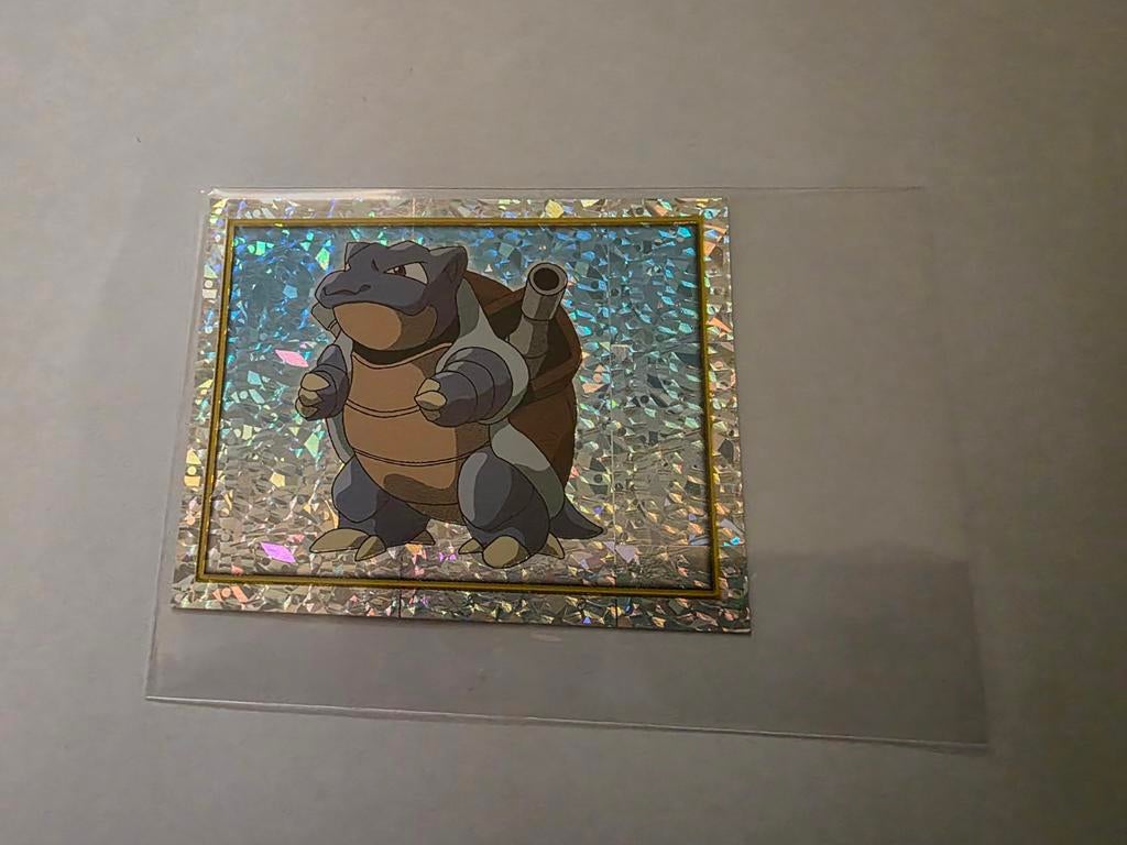 Merlin blastoise prism holo, Hobby en Vrije tijd, Verzamelkaartspellen | Pokémon, Ophalen of Verzenden, Zo goed als nieuw