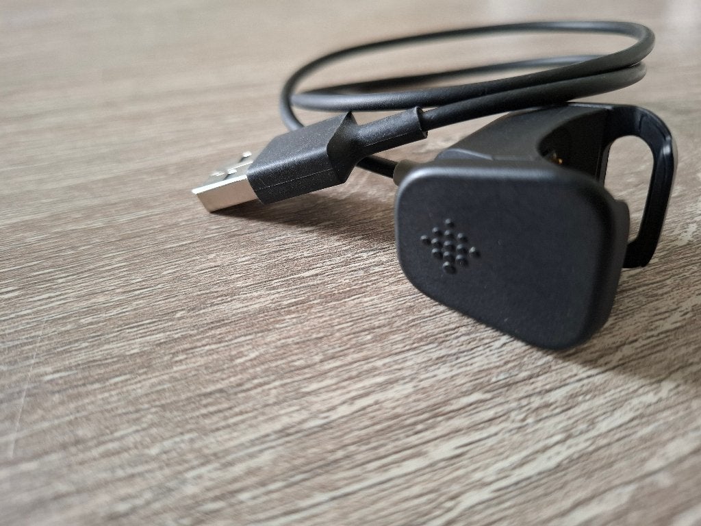 Originele Fitbit Charge 3 oplaadkabel, Sieraden, Tassen en Uiterlijk, Zwart, Ophalen of Verzenden, Zo goed als nieuw, Fitbit