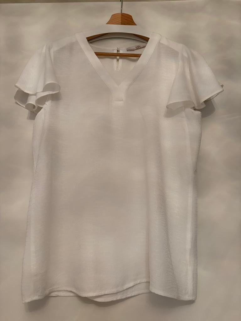 Blousje en klein mouwtje., Ophalen of Verzenden, Zo goed als nieuw, Maat 34 (XS) of kleiner