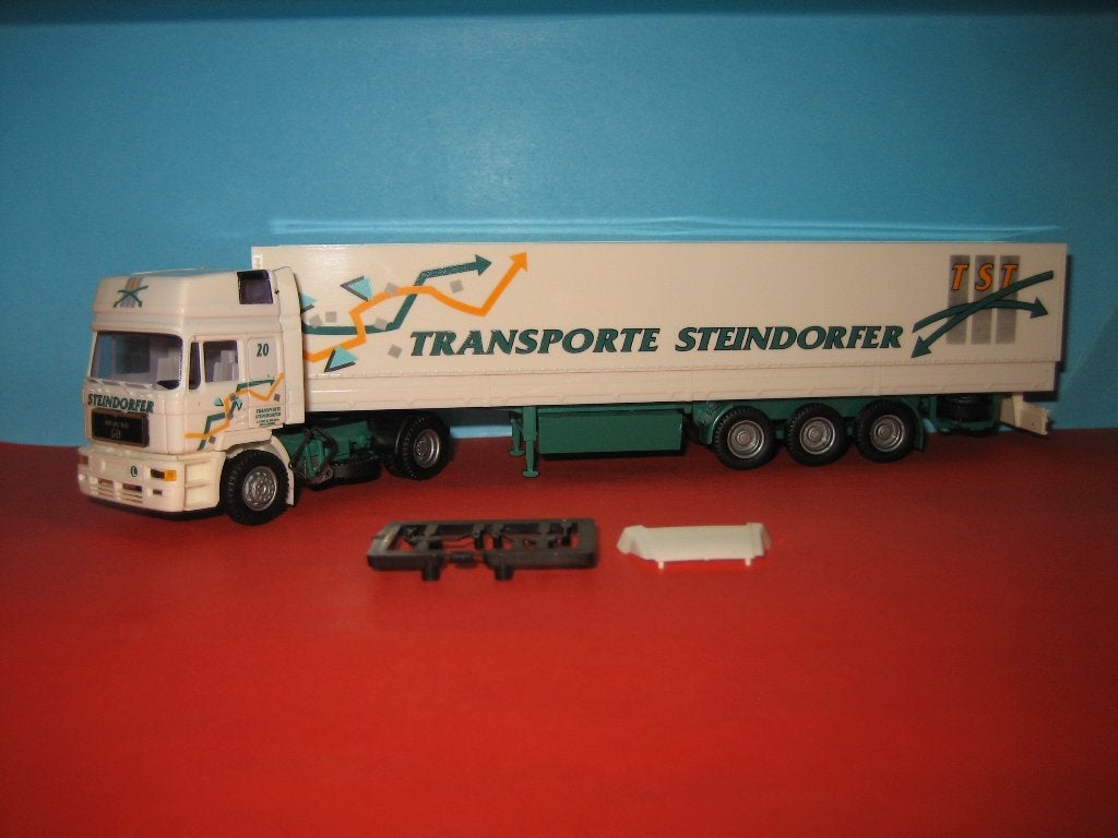 Steindorfer  MAN  met oplegger  AWM, Hobby en Vrije tijd, Modelauto's | 1:87, Ophalen of Verzenden, Gebruikt, Bus of Vrachtwagen