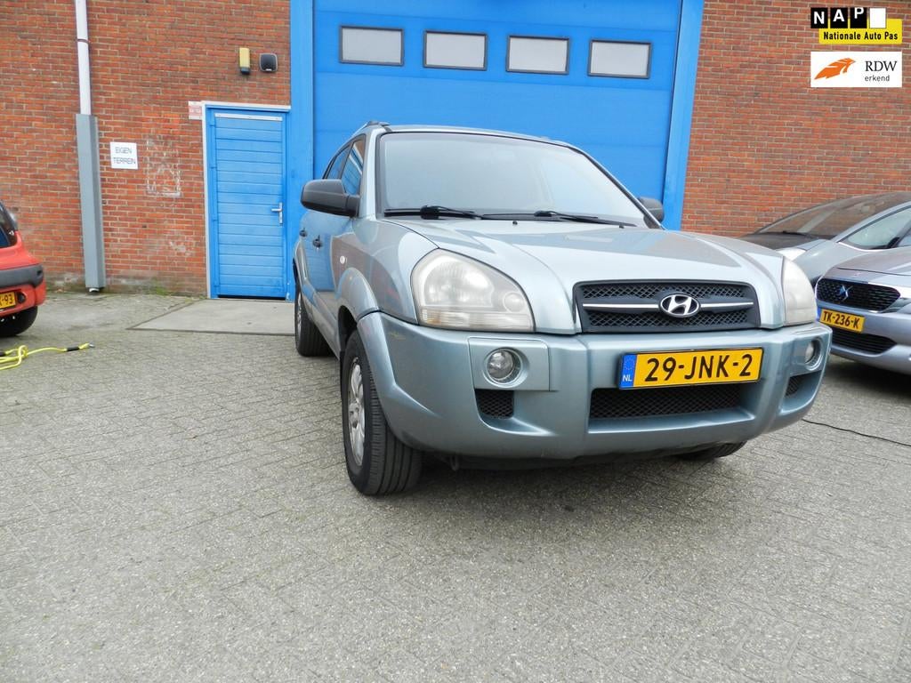 Hyundai Tucson 2.0i Dynamic, Stof, Gebruikt, Zwart, Origineel Nederlands