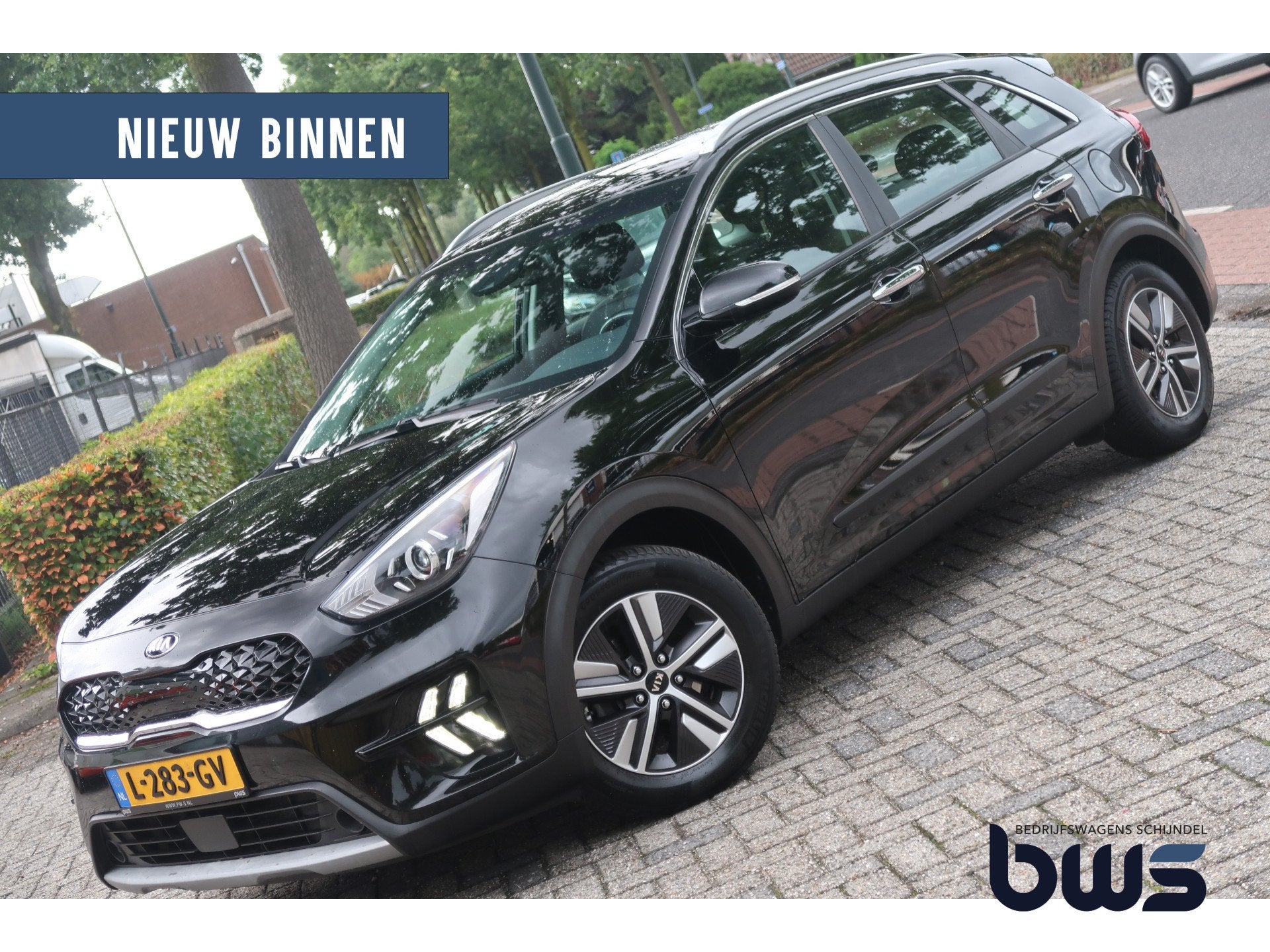 Kia Niro 1.6 GDi Hybrid DynamicLine / trekhaak (bj 2021), Gebruikt, Leder en Stof, Zwart, Origineel Nederlands