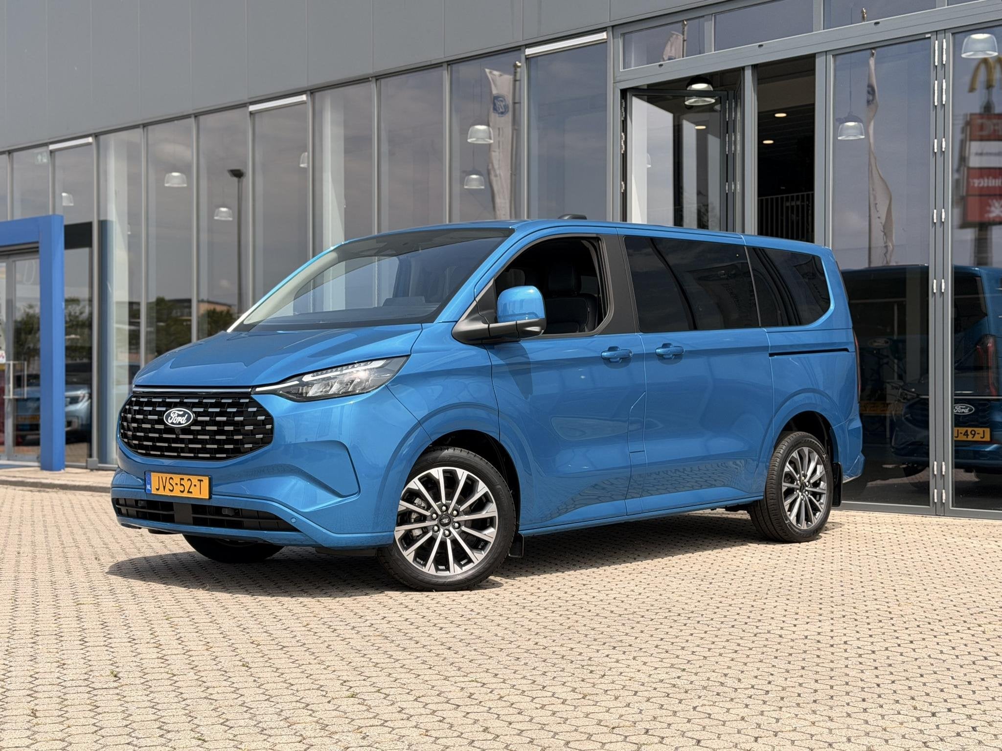 Ford Transit Custom Tourneo 340 L1H1 Titanium X 2.5 233pk PH, Auto's, 232 pk, Gebruikt, 1850 kg, Blauw