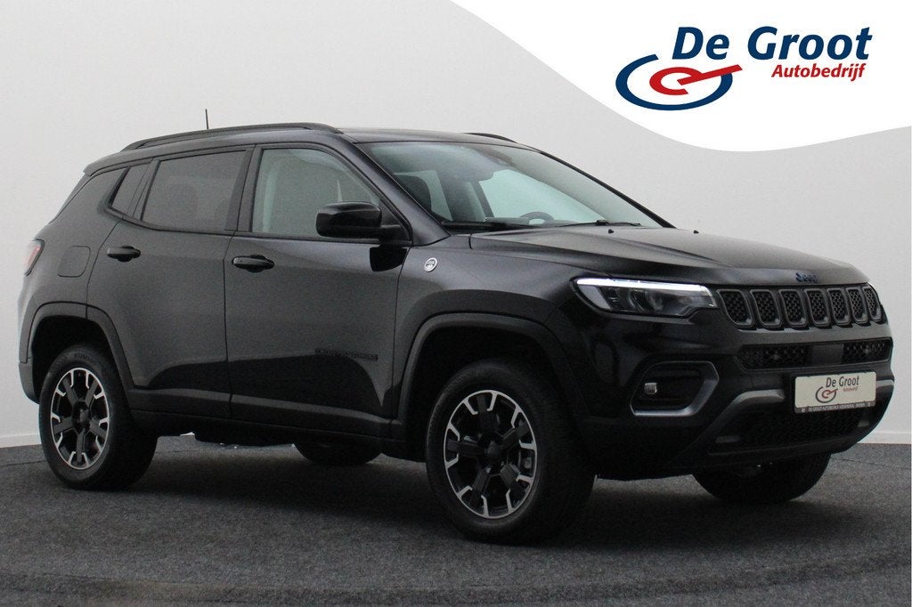 Jeep Compass 4xe 240 Plug-in Hybrid Electric Trailhawk Panor, Auto's, Jeep, Automaat, Zwart, 4 cilinders, Leder en Stof