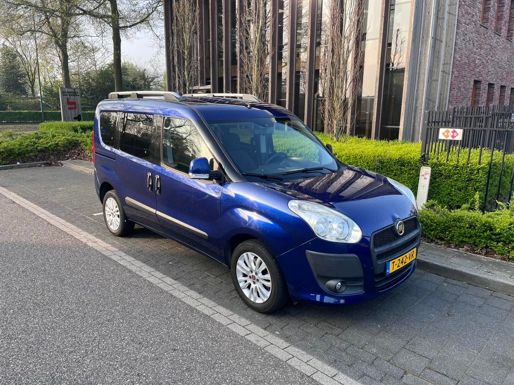 Fiat Doblo 1.4 Benzine (2010) 7-persoons Rij-klaar, Voorwielaandrijving, Stof, Blauw, 7 stoelen