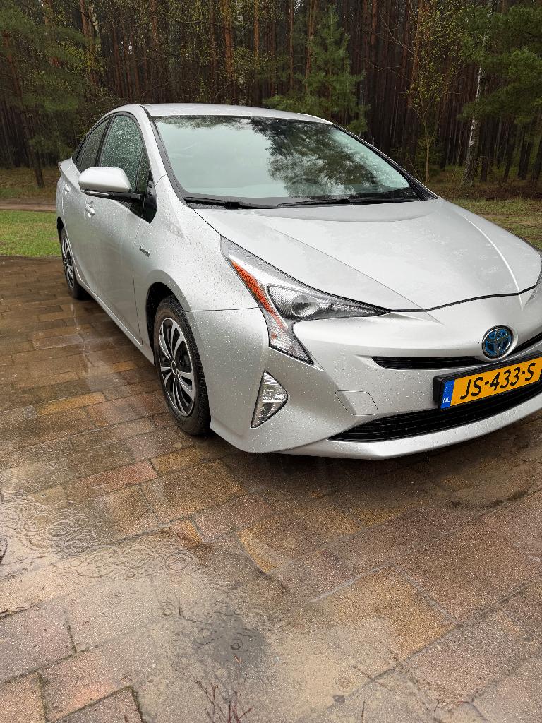 Toyota Prius 1.8 Full Hybrid 122PK Aut 2016 Grijs, Auto's, Stof, 725 kg, 1350 kg, Dealer onderhouden