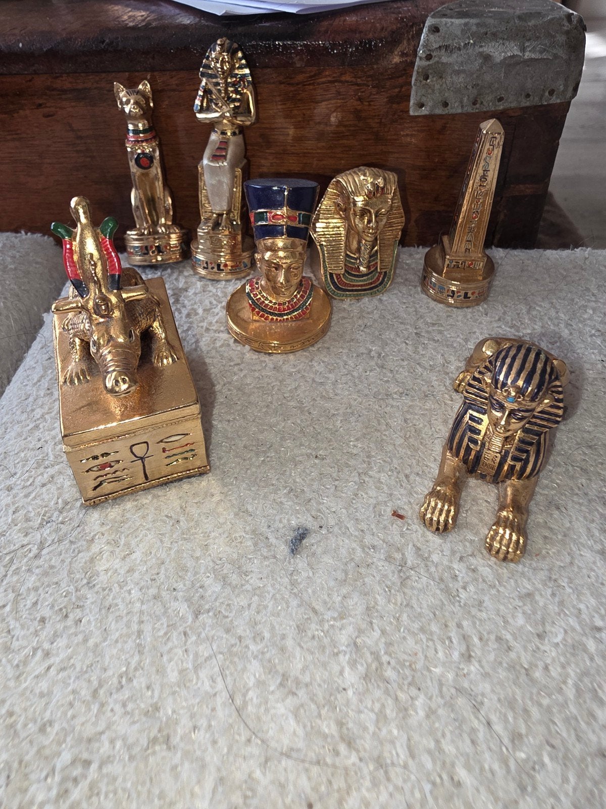 Vergulde Egyptische beeldjes - Set van 7 in goede staat, Verzamelen, Ophalen, Gebruikt, Overige typen