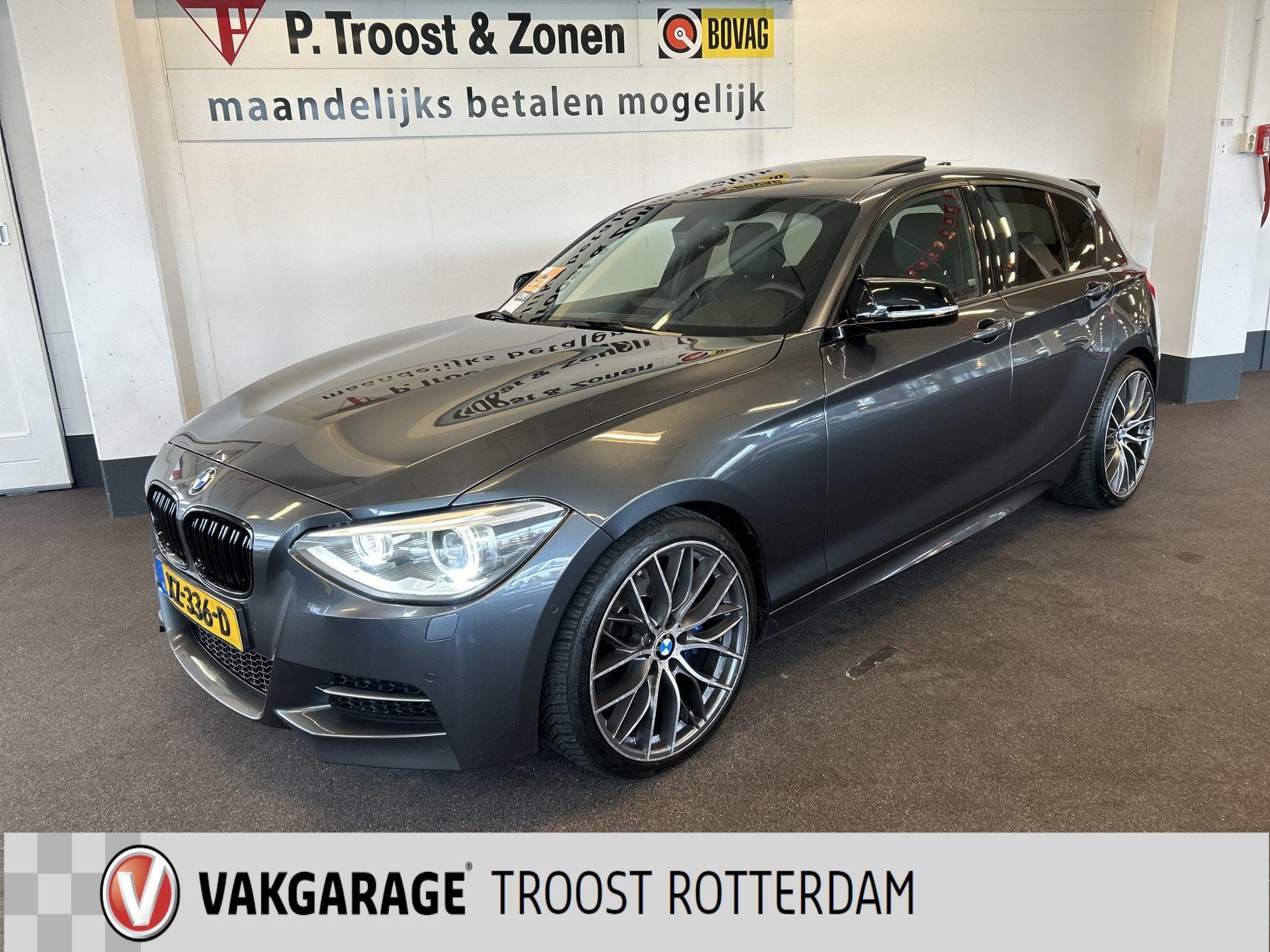 BMW 1-serie M135i xDrive High Executive 6 Cilinder | Panoram, Auto's, Euro 5, Gebruikt, Zwart, Met garantie (alle)