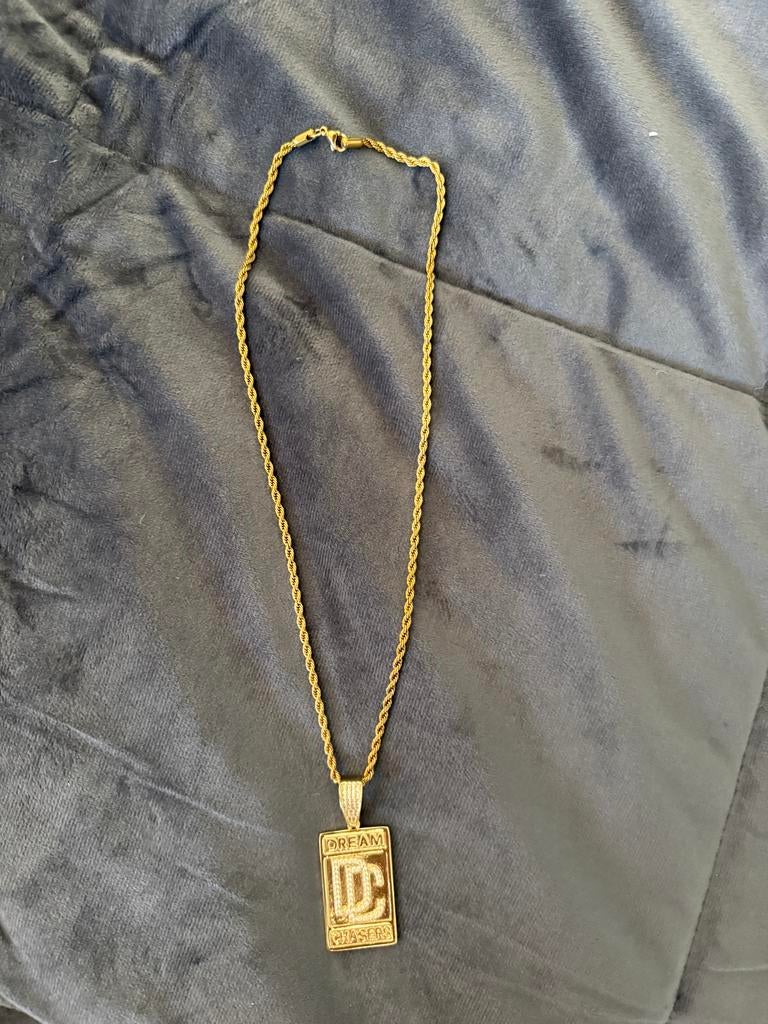 Gouden ketting met 'Dream Chasers' hanger, Ophalen of Verzenden, Gebruikt, Goud, Met hanger