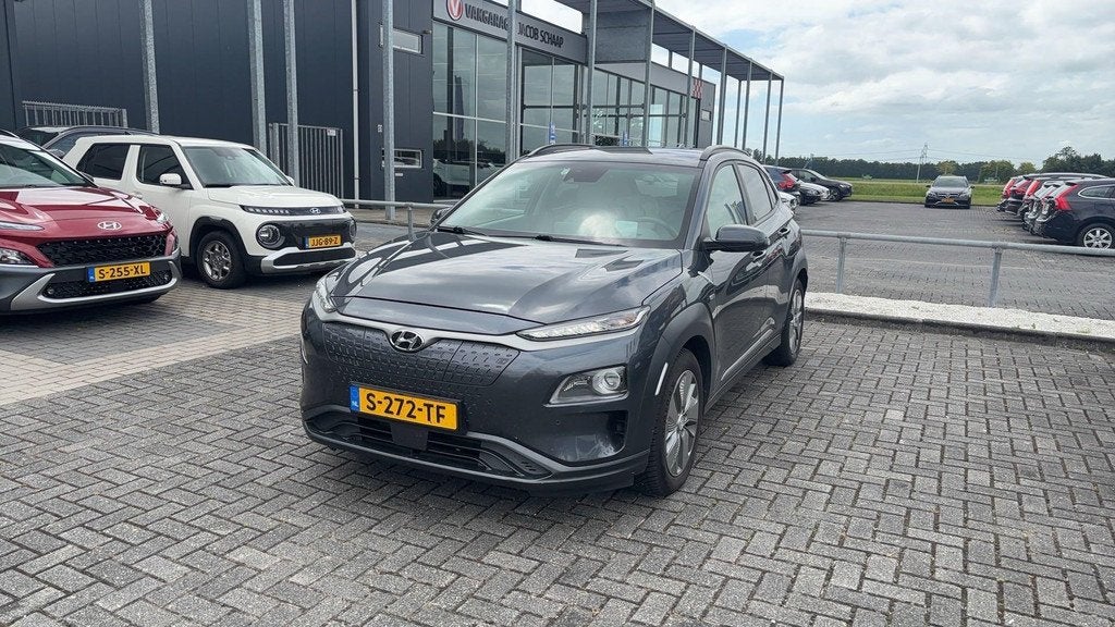 Hyundai Kona EV Comfort 64 kWh | SOH 99% | All Season Banden, Auto's, Hyundai, 12 maanden, Stof, Gebruikt, 64 kWh
