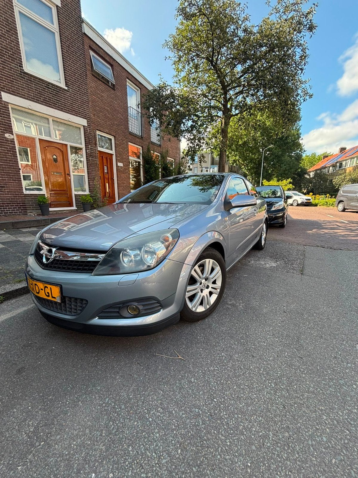 Opel Astra 1.4 16V GTC 2007 Grijs, Auto's, Voorwielaandrijving, 4 cilinders, 49 €/maand, Origineel Nederlands