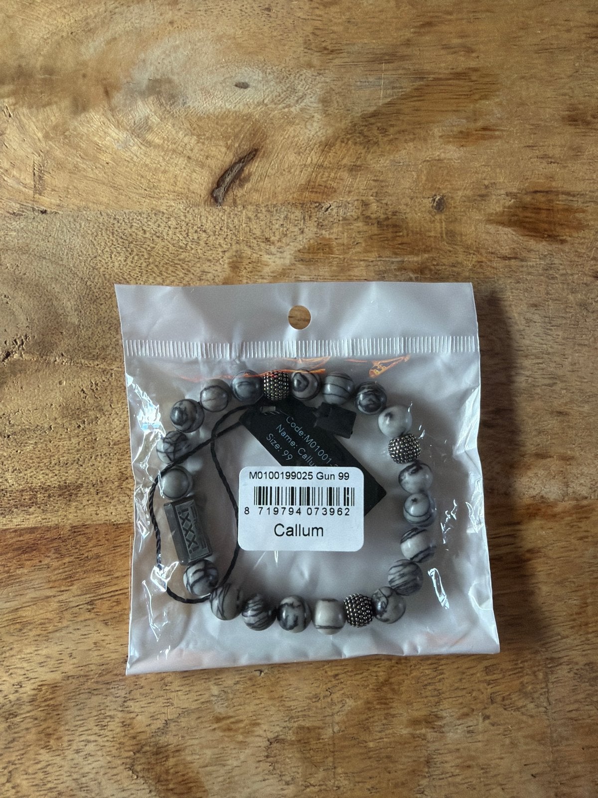 Ixxxi Armband Callum met grijze kralen, Sieraden, Tassen en Uiterlijk, Armbanden, Ophalen of Verzenden, Nieuw, Grijs, Overige materialen