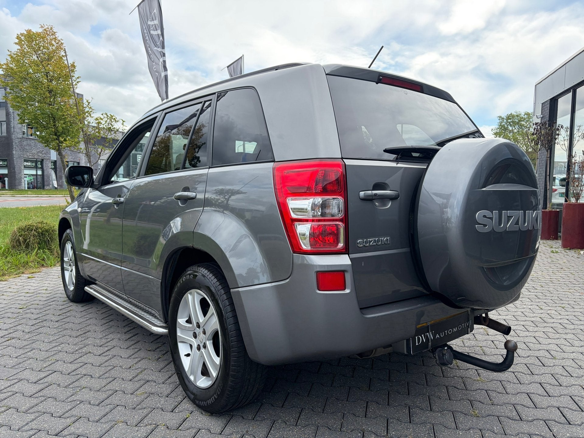 Suzuki Grand Vitara 2.0-16V Exclusive, Auto's, Suzuki, Stof, Zwart, 4 cilinders, 1850 kg