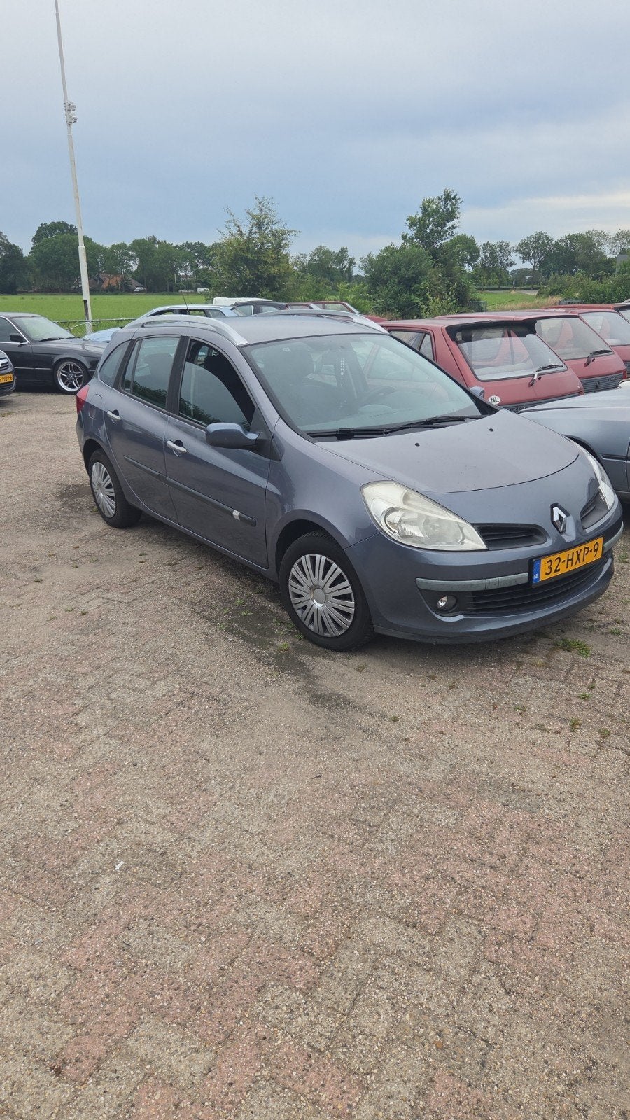 Renault Clio 1.6 16V 82KW Estate 2009 Blauw, Voorwielaandrijving, Metallic lak, 1145 kg, Zwart