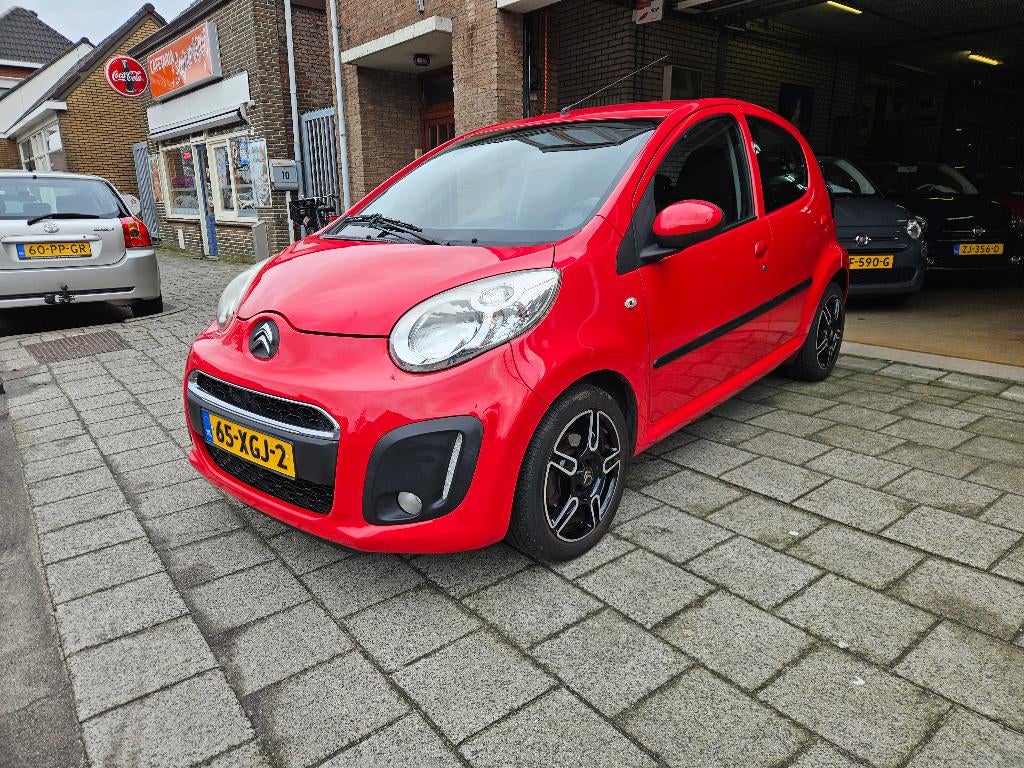Citroën C1 1.0i Tendance 68PK 5D 2012 Rood, Auto's, Voorwielaandrijving, Euro 5, Stof, 4 stoelen