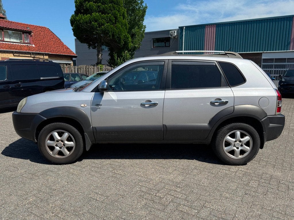 Hyundai Tucson 2.7i V6 4WD Style LEER/CLIMA/TREKHAAK, Auto's, Hyundai, Automaat, Gebruikt, 2656 cc, Bedrijf