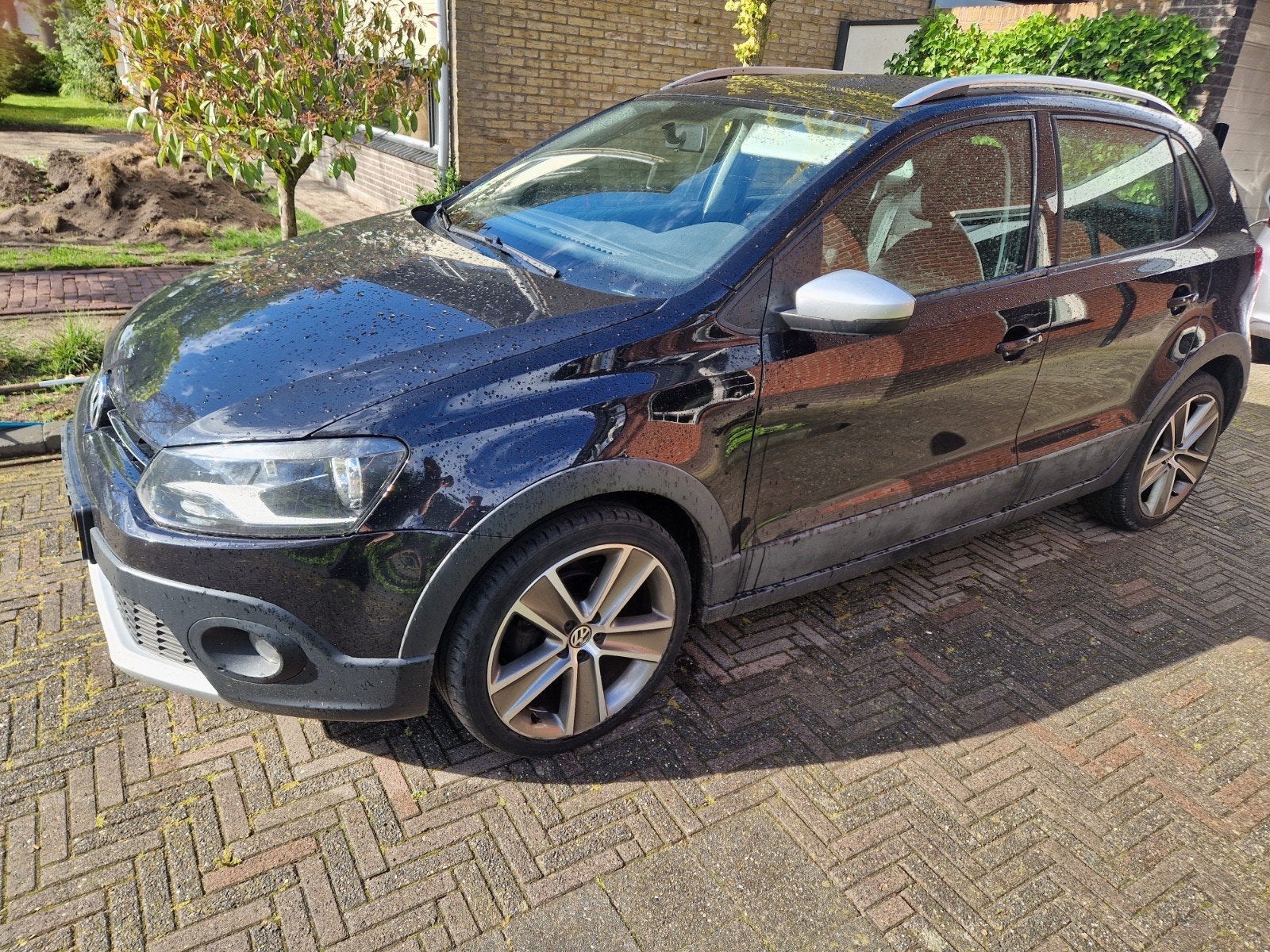 Volkswagen Polo 1.2 TSI 66KW 3D BMT 2012 Zwart, Voorwielaandrijving, Stof, 4 cilinders, Zwart