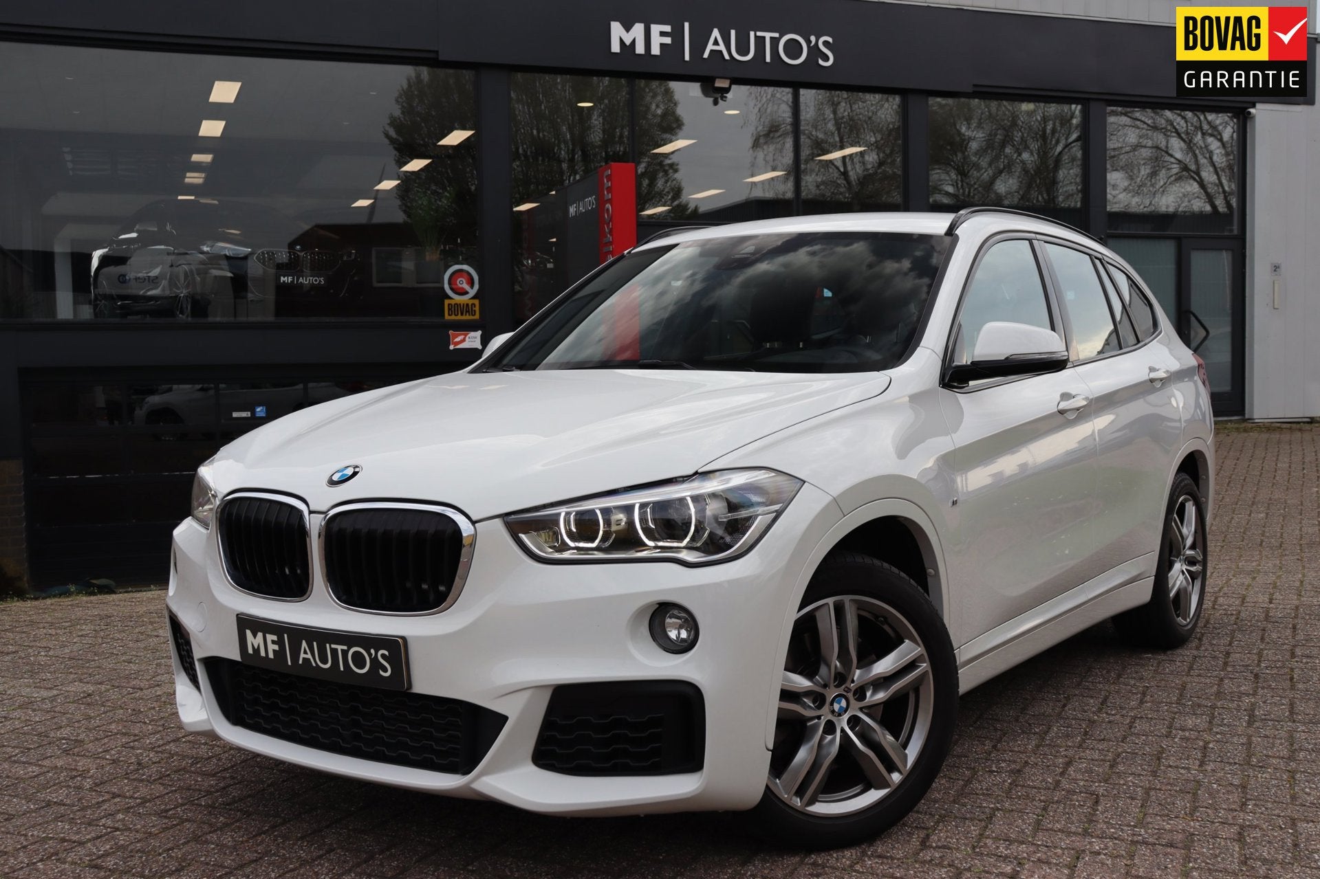 BMW X1 SDrive20i High Executive M Sport 192PK|Led|PDC|Navi|C, Auto's, BMW, 1998 cc, Euro 6, Alcantara, Wit