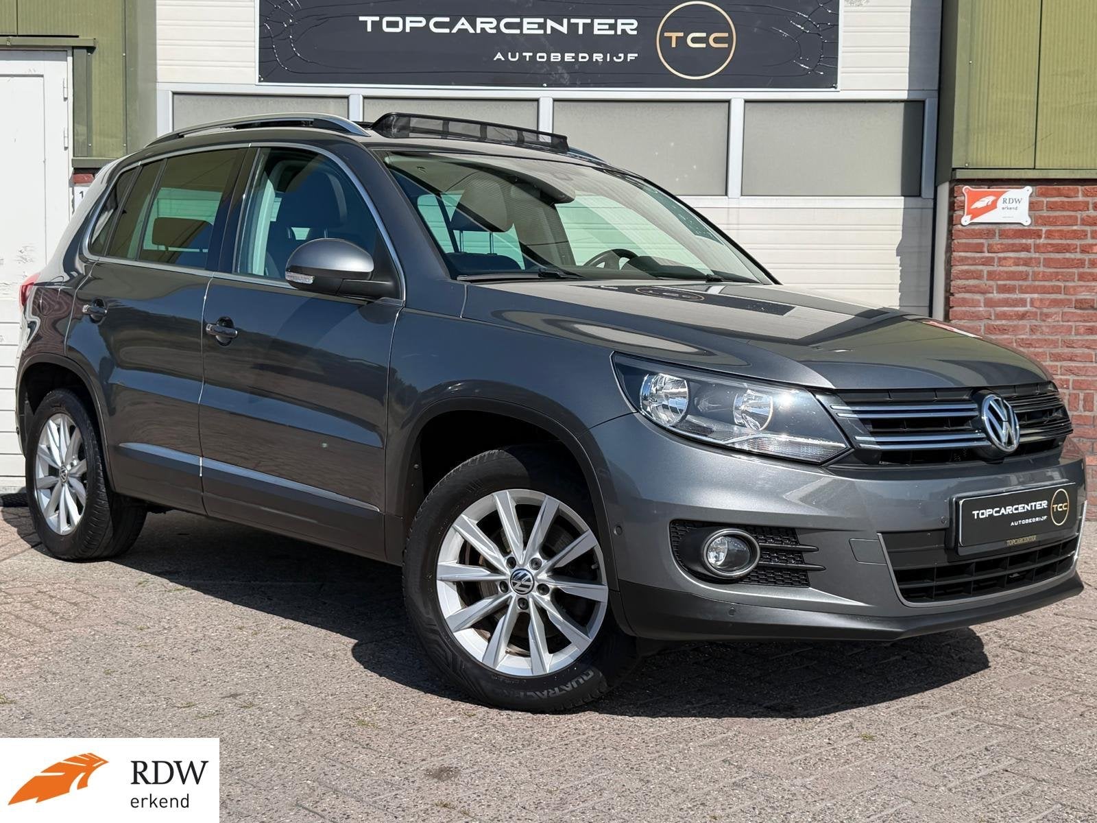 Volkswagen Tiguan 2.0 TSI Sport 4Motion/PANO/NAVI/PARKS/APK, Auto's, Euro 5, Gebruikt, 4 cilinders, Bedrijf