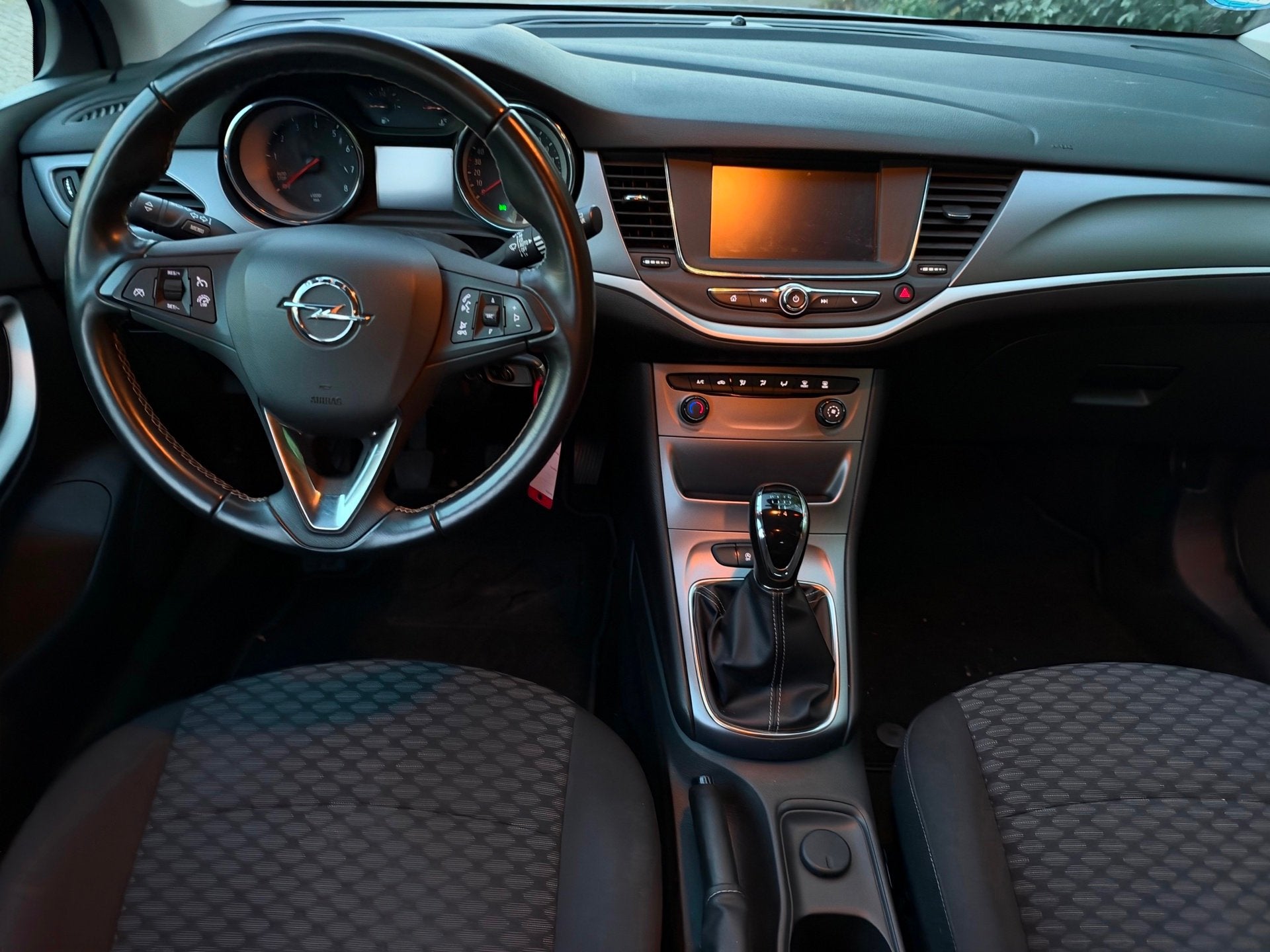 Opel Astra Sports Tourer 1.0 Online Edition APK 05-2027 Airc, Auto's, Voorwielaandrijving, Parkeersensor, Stof, Gebruikt