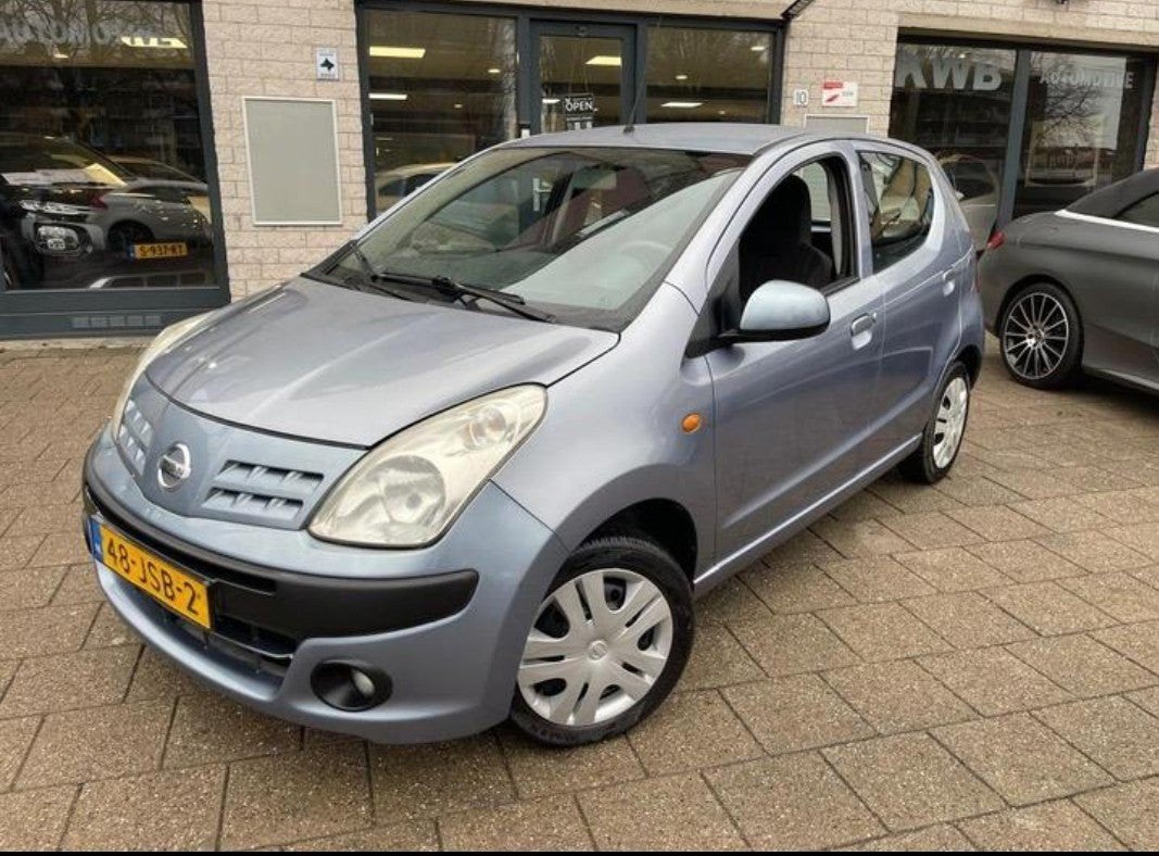Nissan Pixo 1.0 50KW 5D 2009 Grijs, Auto's, Voorwielaandrijving, Bluetooth, Stof, 200 kg