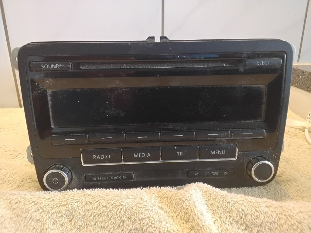 VW Golf 5 / Caddy / Skoda autoradio met CD-speler, Ophalen, Gebruikt