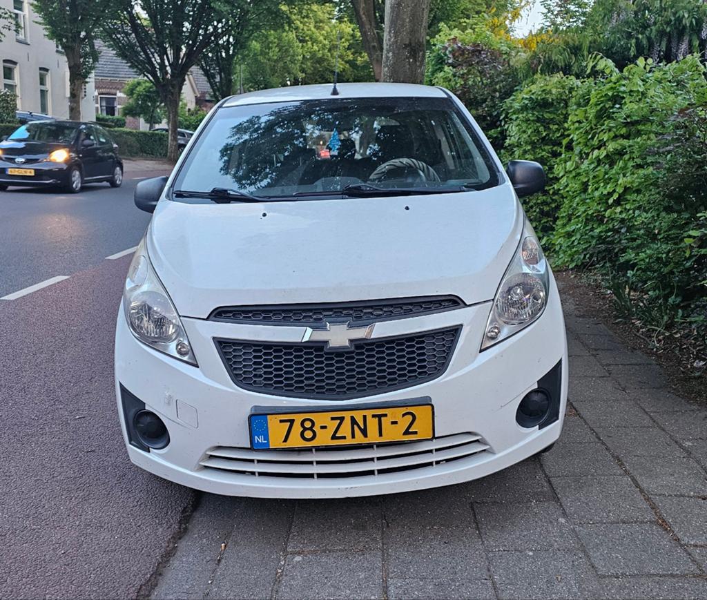 Chevrolet Spark 1.0 Bifuel 2013 Wit 187500 km, Auto's, Voorwielaandrijving, Zwart, Wit, Origineel Nederlands