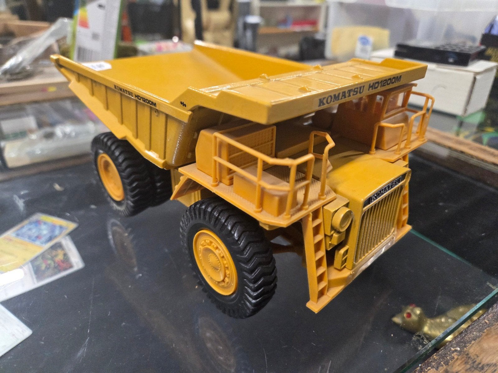 Komatsu HD1200 Dump Yonezawa Toys, Hobby en Vrije tijd, Modelauto's | 1:50, Ophalen of Verzenden, Gebruikt, Bus of Vrachtwagen