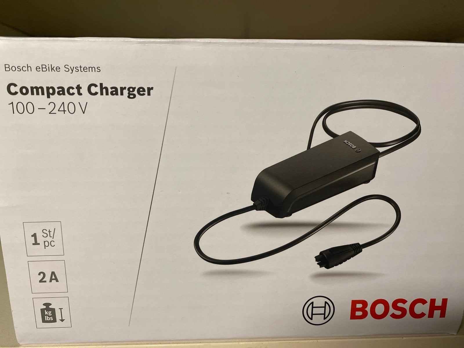 Bosch Compact Charger 100-240V voor e-bike accu, Fietsen en Brommers, Nieuw
