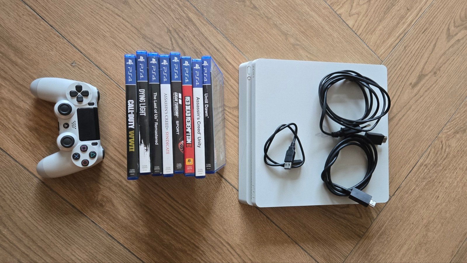 PlayStation 4 Slim 500GB Wit met Controller en 9 Games, Spelcomputers en Games, Verzenden, Zo goed als nieuw, Overige genres, Eén computer