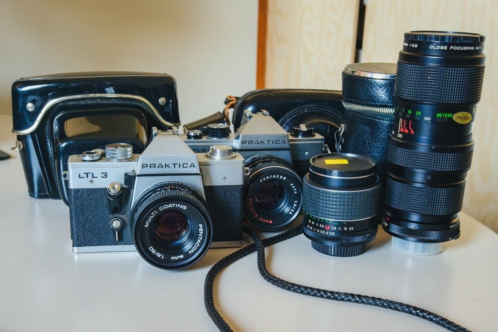 2 praktica camera's en lenzen, tassen etc. M42 schroefdraad, Gebruikt, Spiegelreflex, Ophalen of Verzenden, Overige Merken