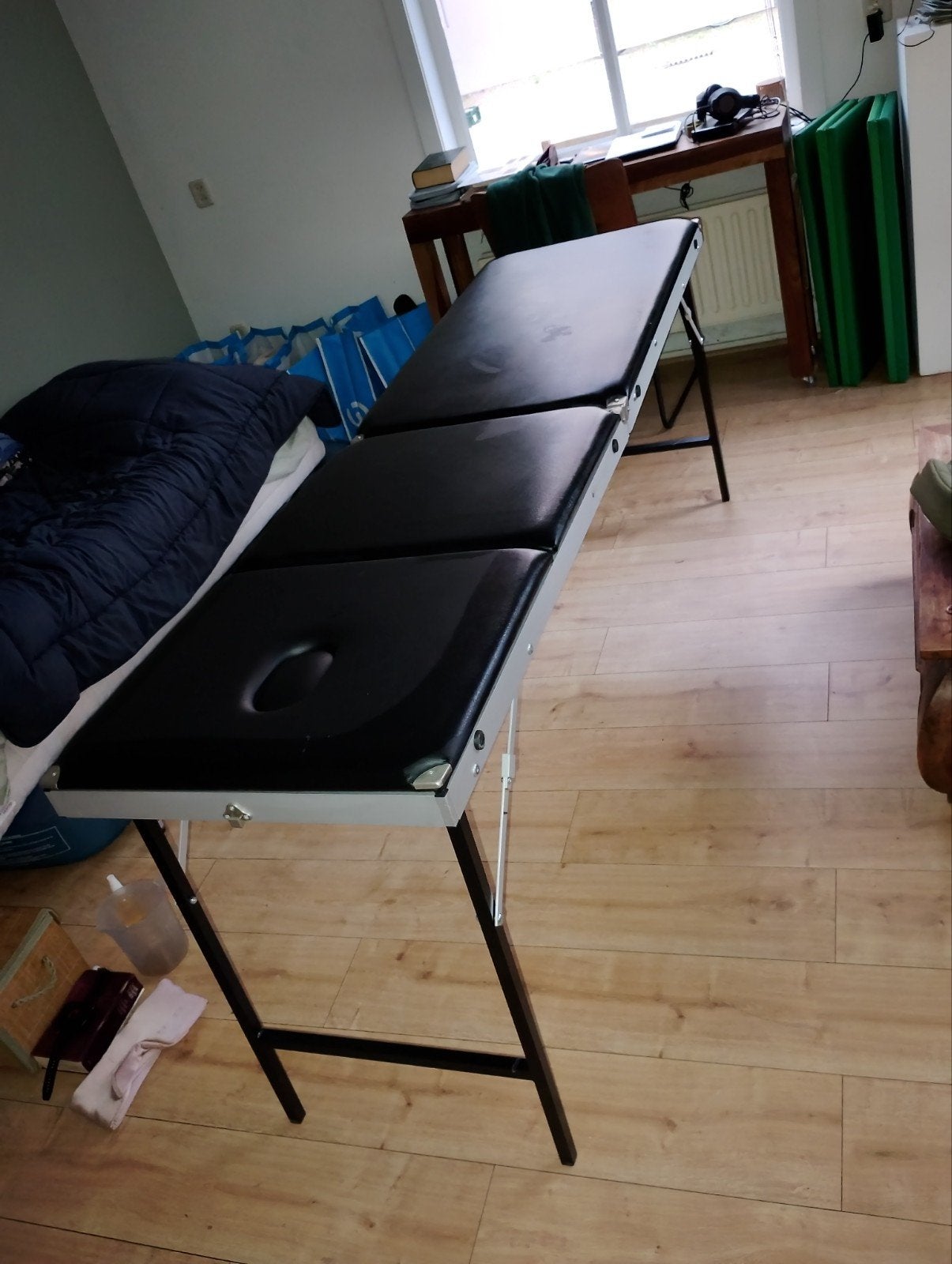 eenvoudige massagetafel, Ophalen