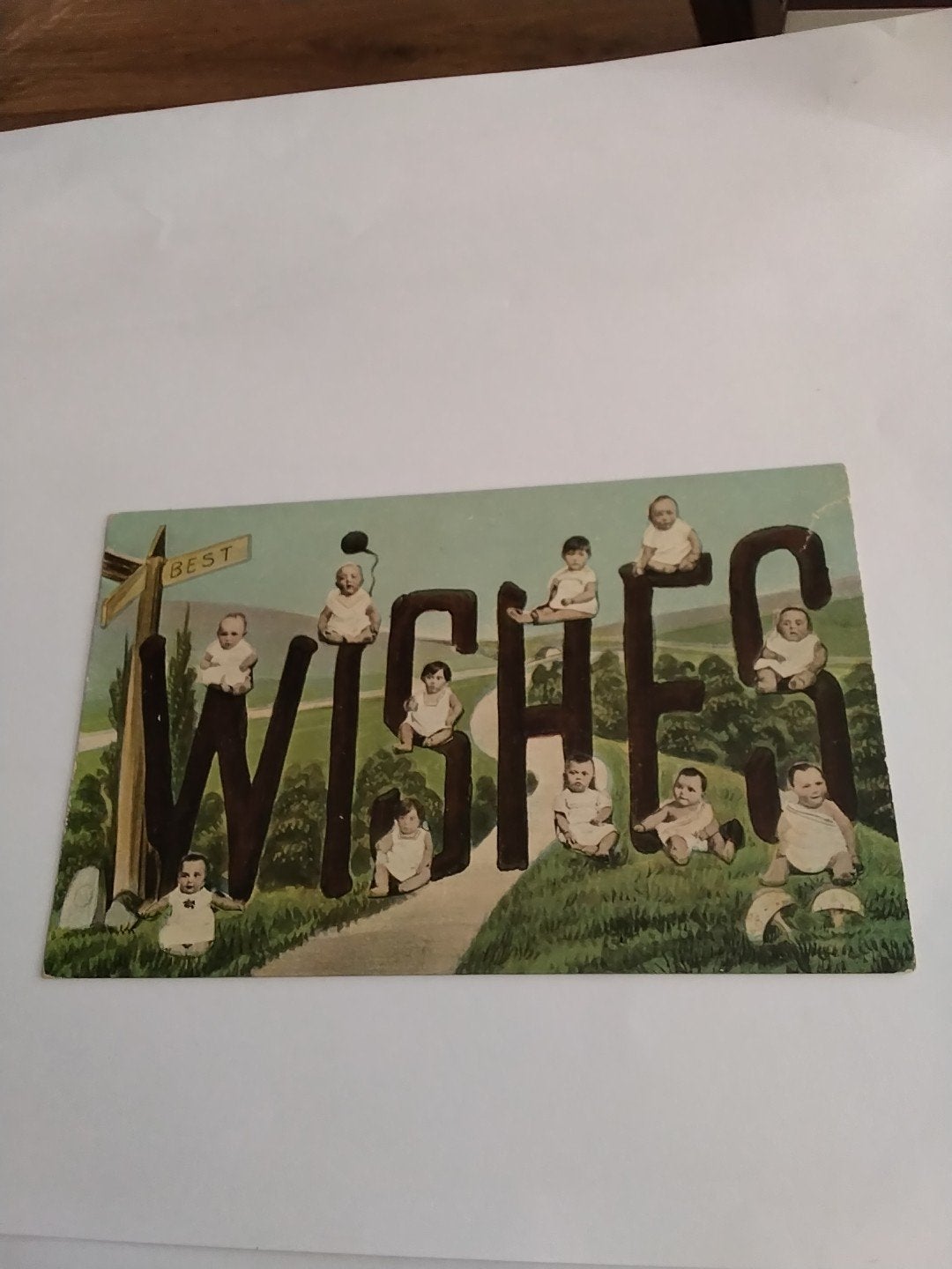 Antieke ansichtkaart 'Best Wishes' met baby's, Ophalen of Verzenden, Voor 1920