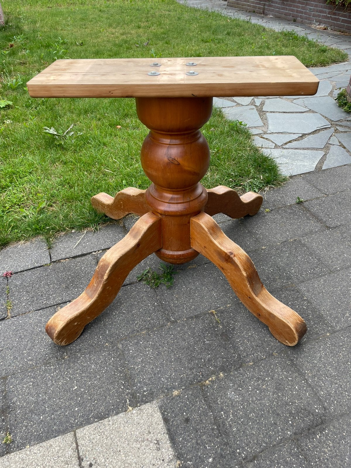 Bolpoot eettafel voet hout, Ophalen