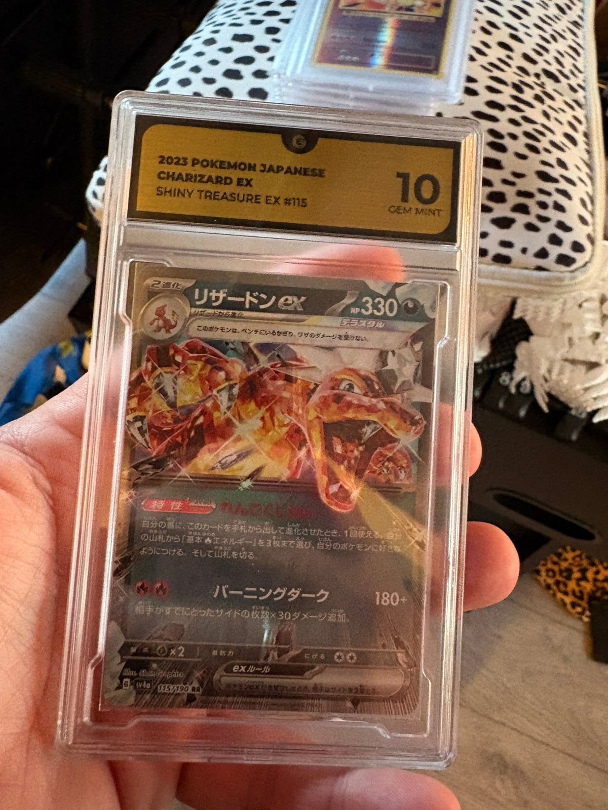 Charizard ex grade 10, Ophalen of Verzenden, Zo goed als nieuw, Meerdere kaarten, Foil