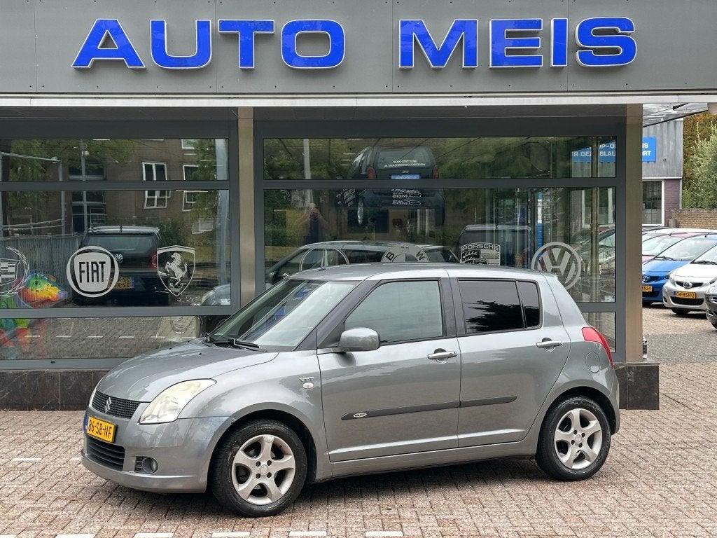 Suzuki SWIFT 1.5 Exclusive Airco Trekhaak Nieuw APK, Auto's, Voorwielaandrijving, 15 km/l, 4 cilinders, 400 kg