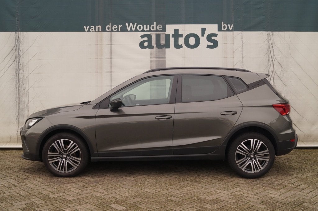 SEAT Arona 1.0 TSI Style Limited -ECC-PDC-CRUISE- (bj 2022), Auto's, Dealer onderhouden, Stof, Gebruikt, 95 pk