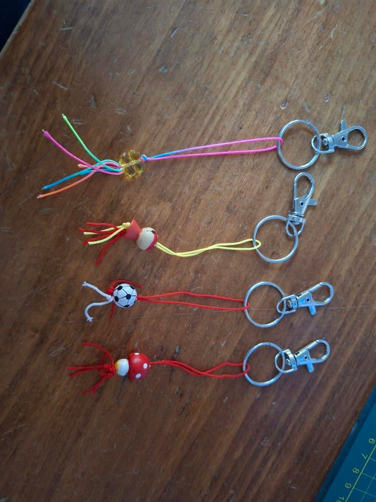 Gelukspoppetjes  sleutelhanger, Ophalen, Nieuw, Staal