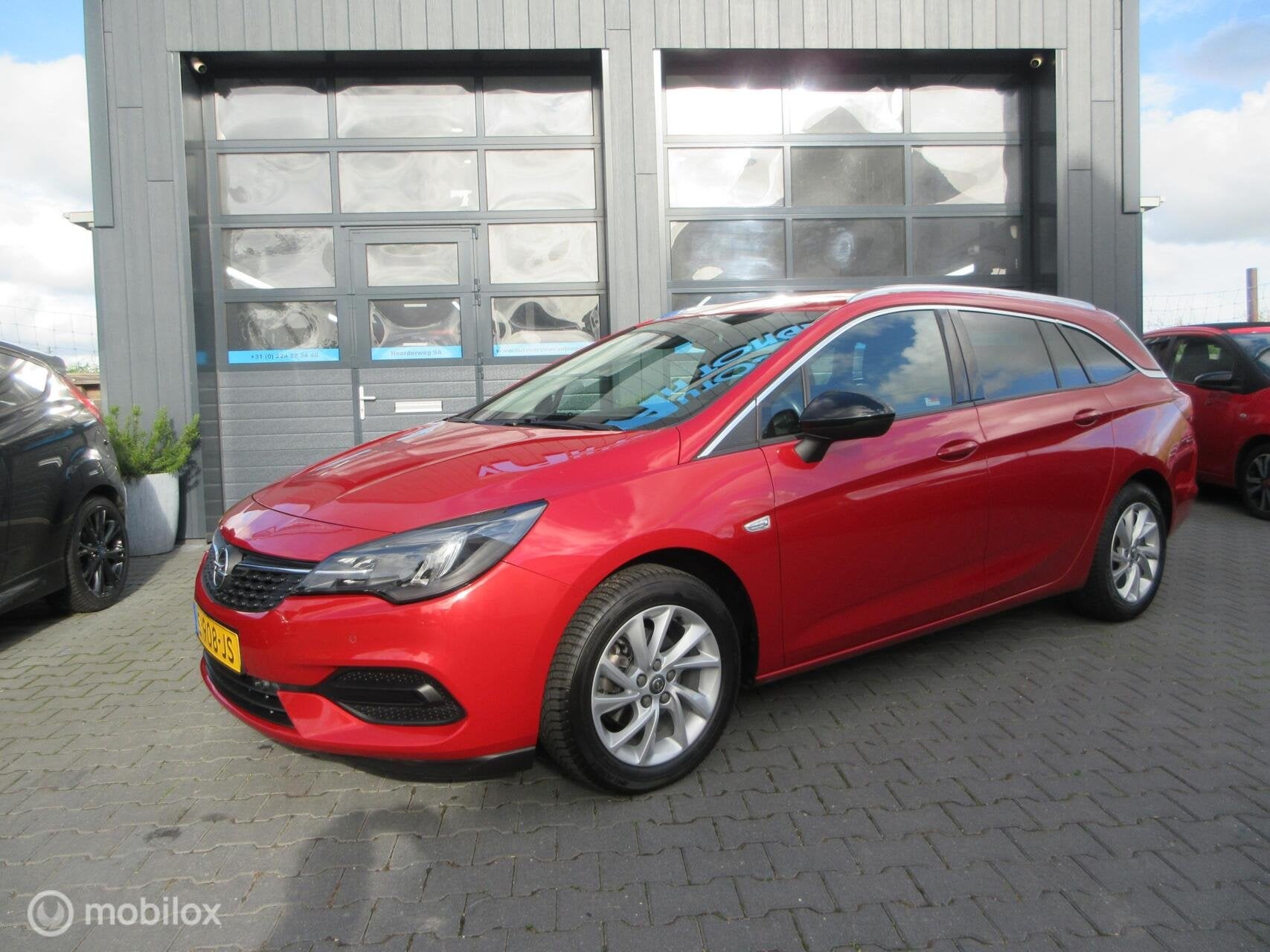 Opel Astra Sports Tourer 1.2 Business Edition 74dkm! Luxe! C, Voorwielaandrijving, 1199 cc, Leder en Stof, Handgeschakeld