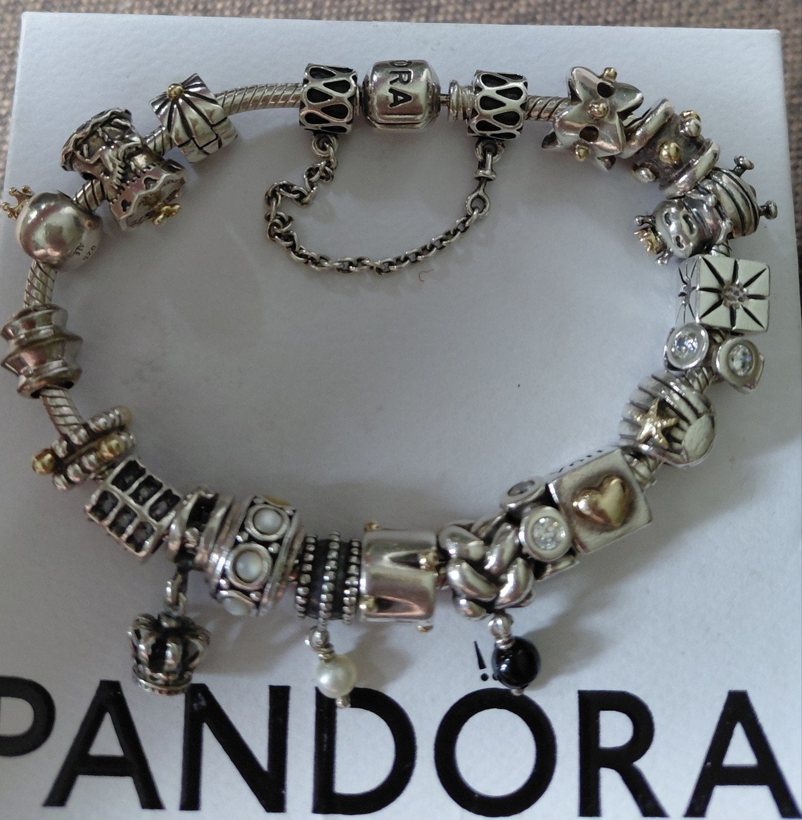 Pandora armband 19bedels oa 14karaat en 18karaat goud two-to, Ophalen of Verzenden, Zo goed als nieuw, Met bedels of kralen, Zilver