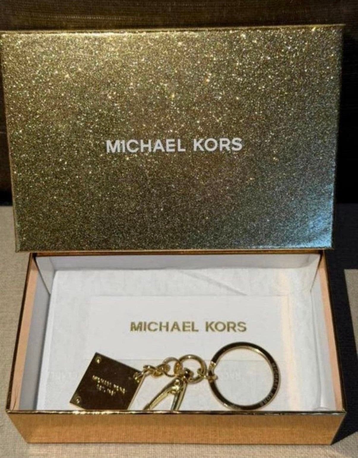 Michael Kors sleutelhanger,goudkleurig hardware nieuw + doos, Ophalen of Verzenden, Nieuw, Merk