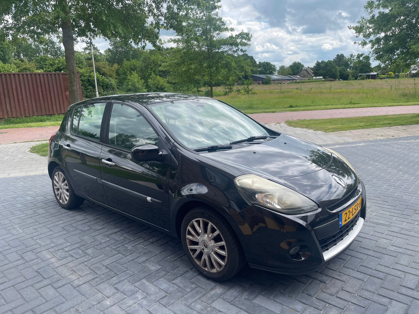 Renault Clio 1.2 TCE 5-DRS 2010 Zwart renault clio auto, Auto's, Voorwielaandrijving, 535 kg, Zwart, 4 cilinders