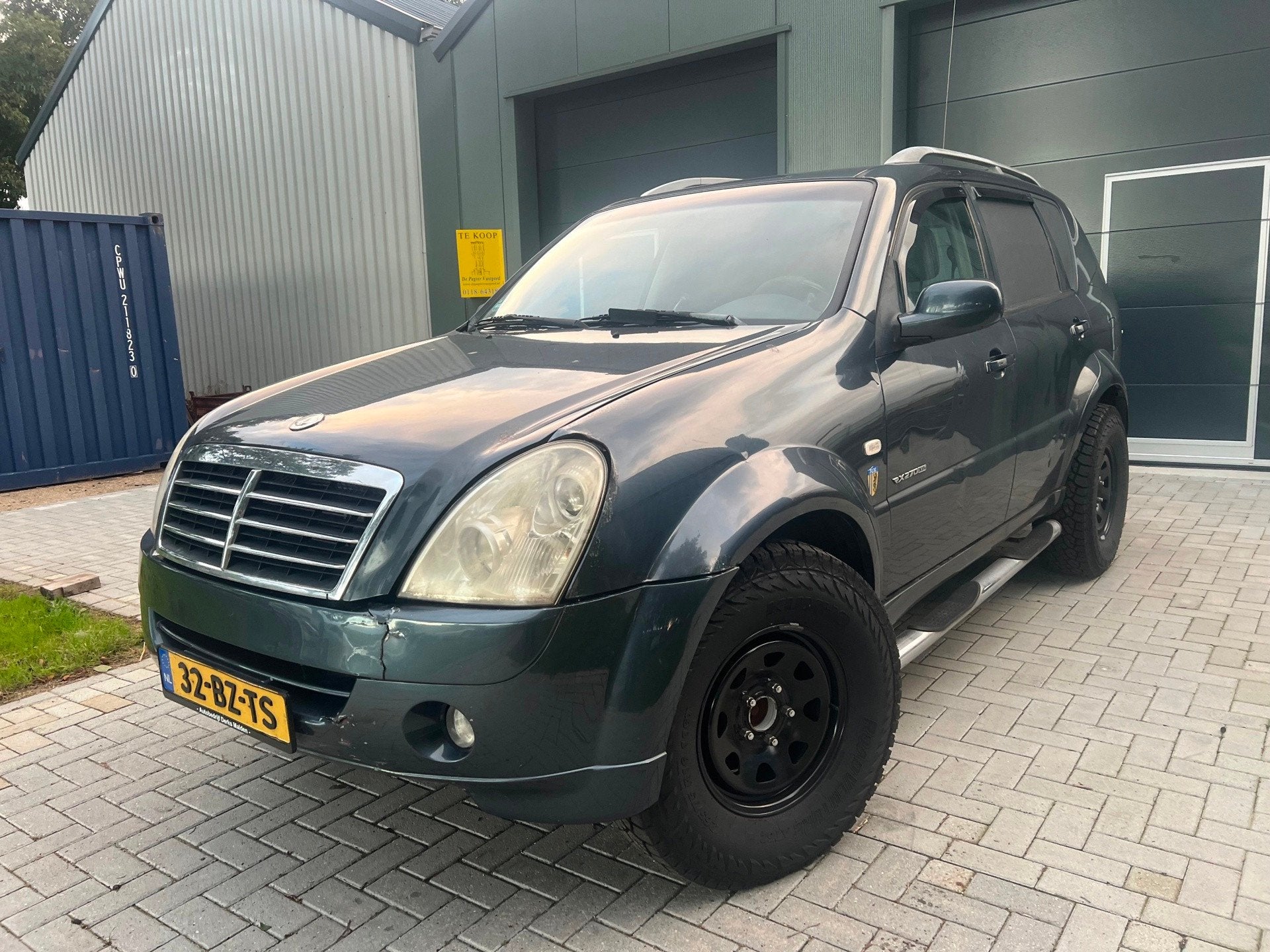 SsangYong Rexton RX 270 Xdi High Roof 4x4, Auto's, Stof, Gebruikt, Origineel Nederlands, Bedrijf