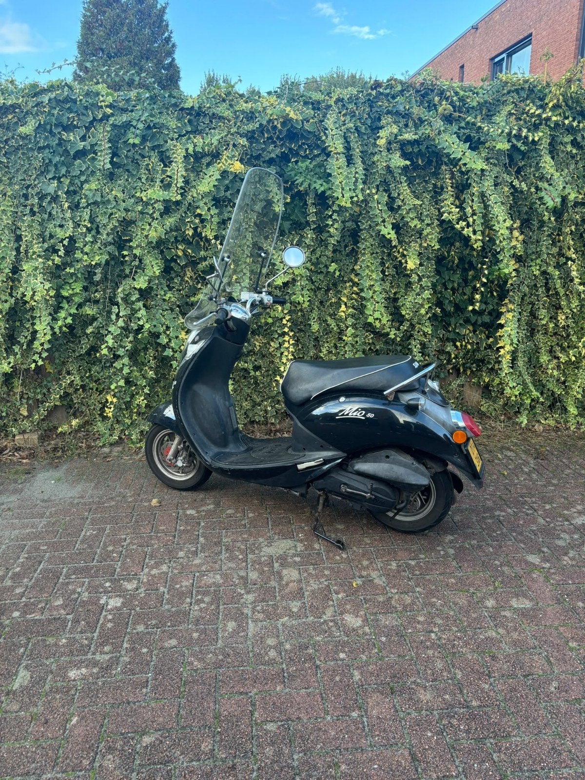 Sym Mio scooter - Geel kenteken - Opknapper, Fietsen en Brommers, Gebruikt, Benzine, Ophalen, Mio